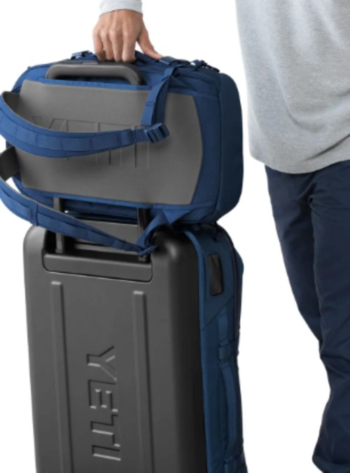 A versatile backpack with a trolley sleeve